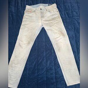 Diesel Jogg jeans light blue with brown stains Sz 31 pre owned great condition